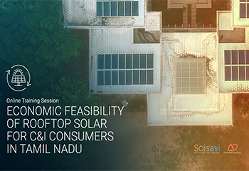 An Aerial view of a building with rooftop solar panel with forest in its vicinity, economic feasibility of rooftop solar for C&I consumers in Tamil Nadu